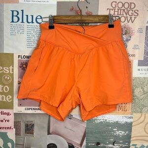 HALARA High Waisted Crossover Side Pocket 2-in-1 Quick Dry Yoga Shorts 4”